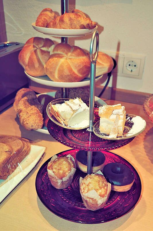 Breakfast buffet with cakes and bread in the Pension Zillertal